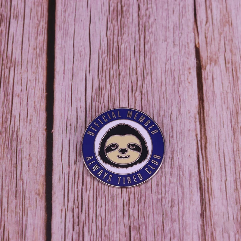 Always tired club round sloth pin badge