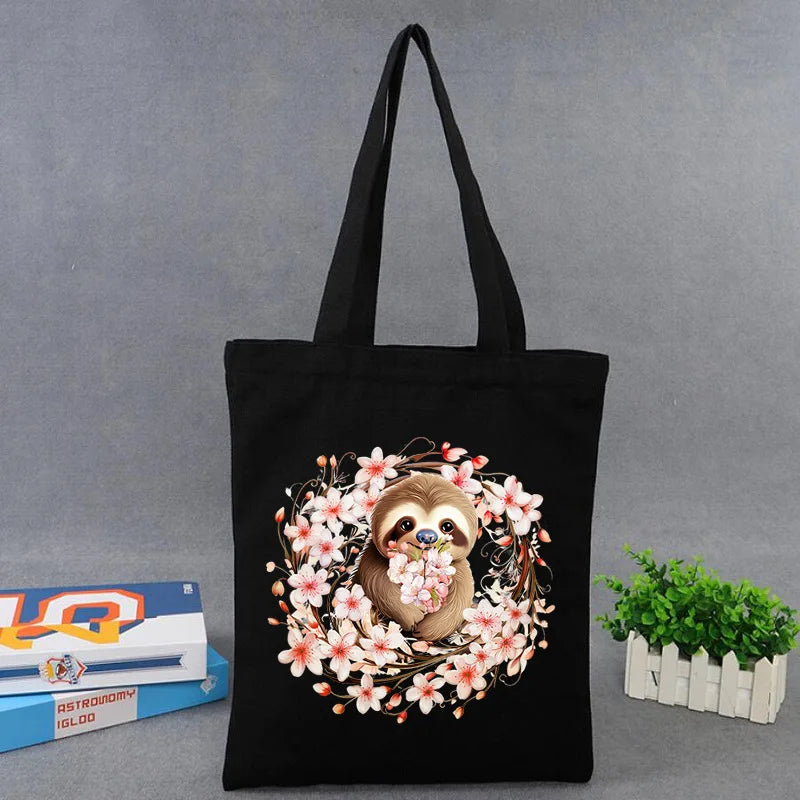 Where Calm Meets Cherry Blossoms Sloth Tote Bag