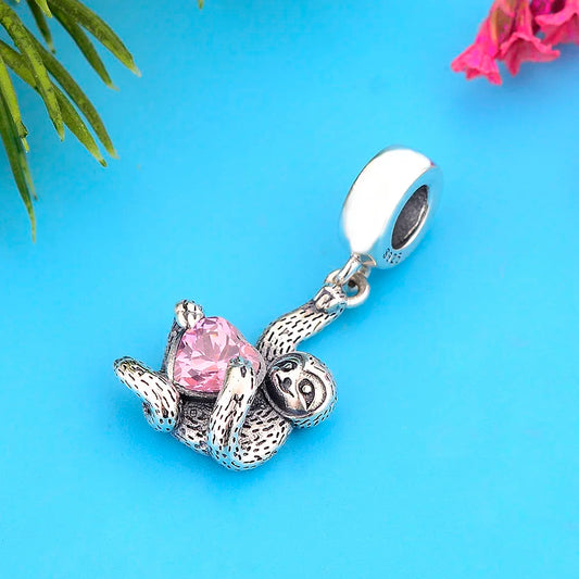 Sterling Silver Sloth Hugging a Pink Heart Dangling Charm