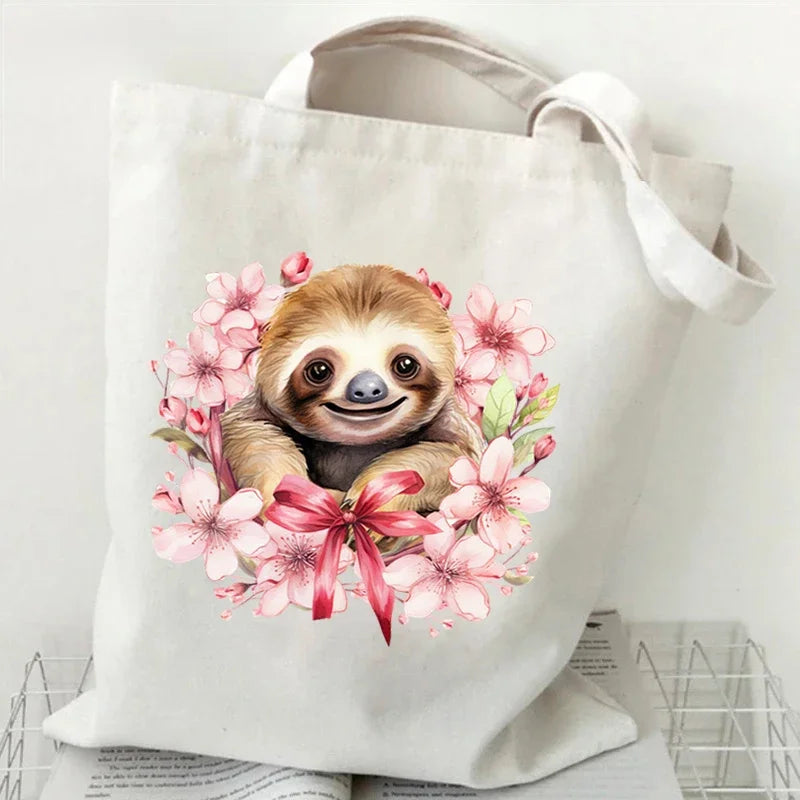 Sloth Sakura Tote Bags