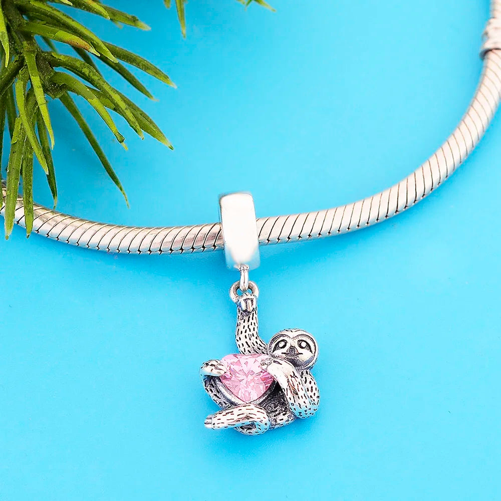 Sterling Silver Sloth Hugging a Pink Heart Dangling Charm