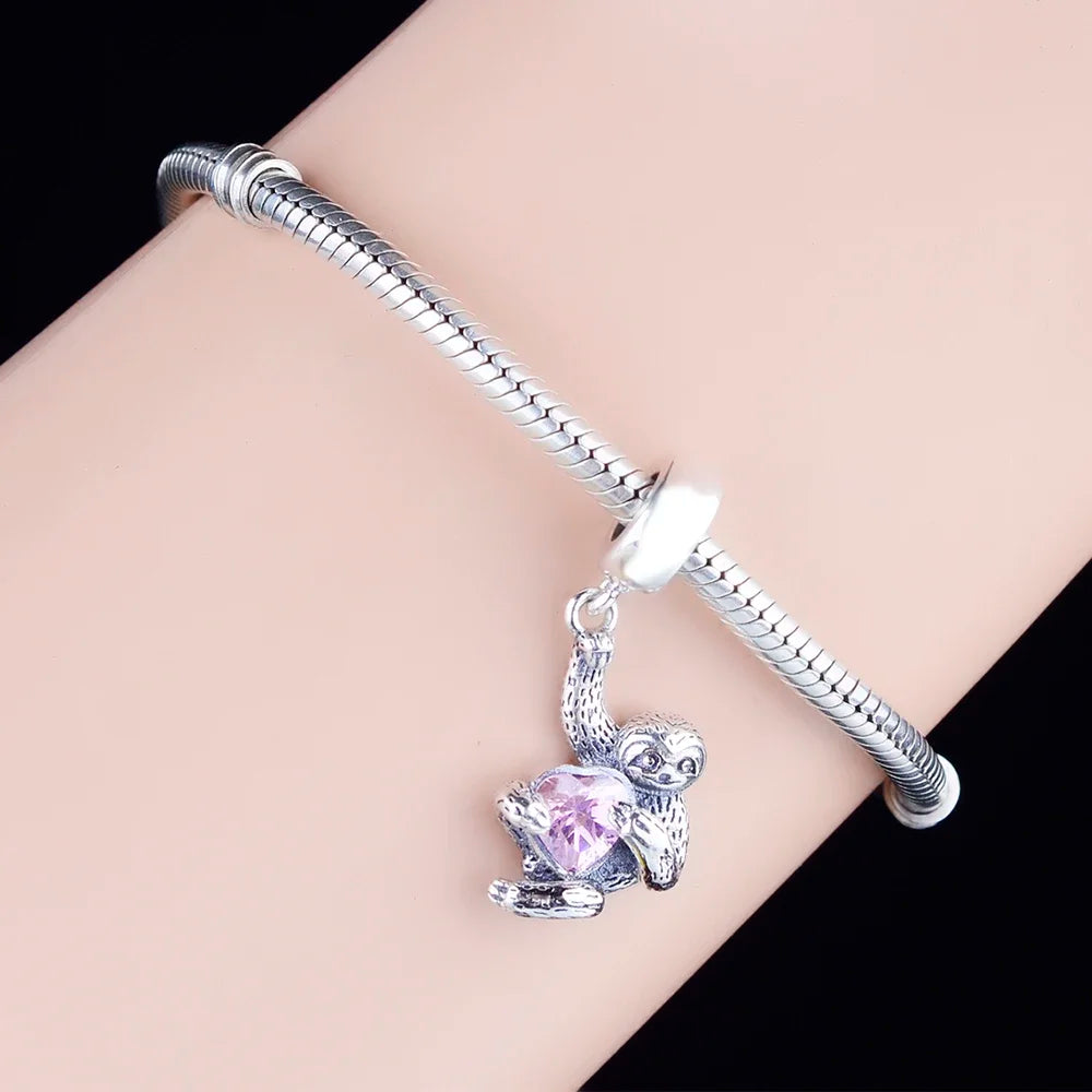 Sterling Silver Sloth Hugging a Pink Heart Dangling Charm