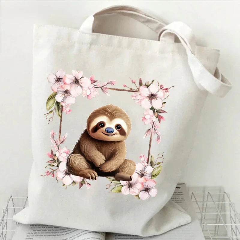 Sloth Sakura Tote Bags